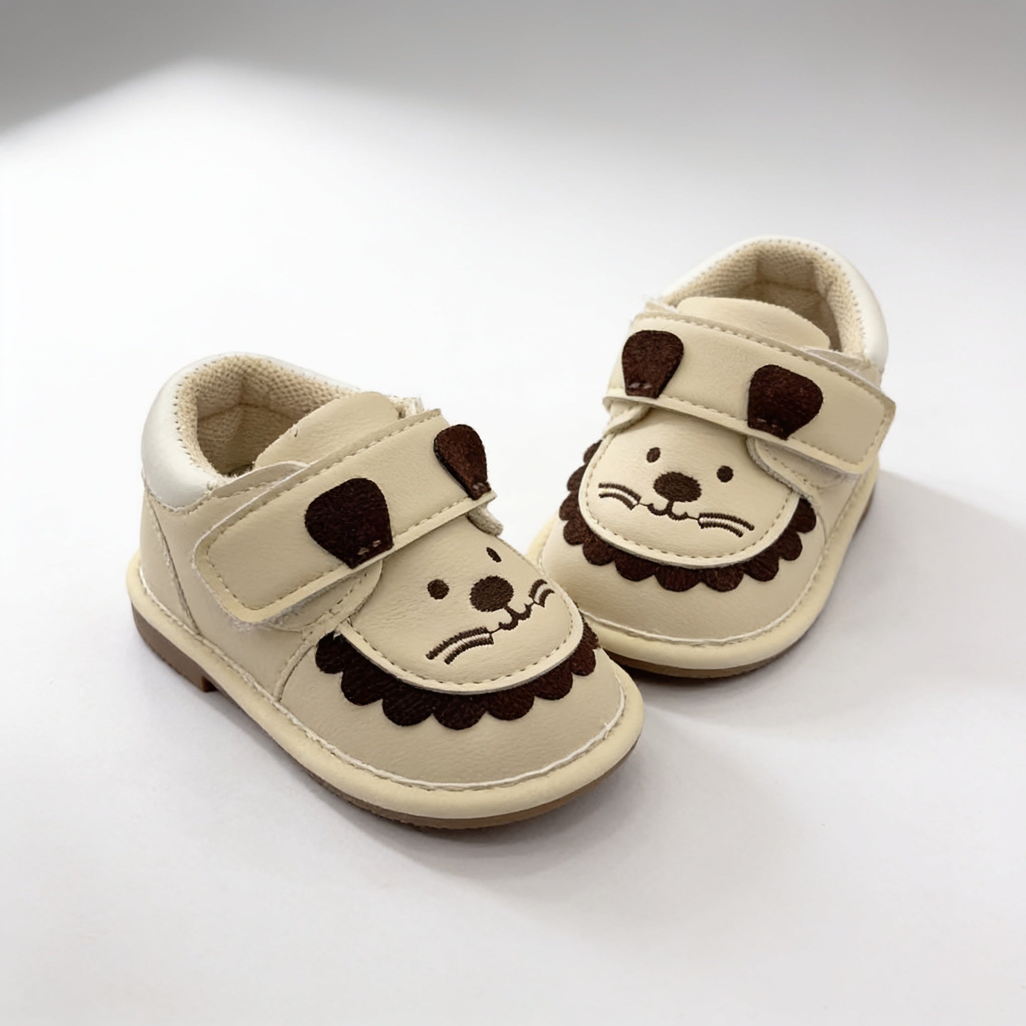 Chaussures a sifflet lionceau - beige - vue produit - Candy Bebe