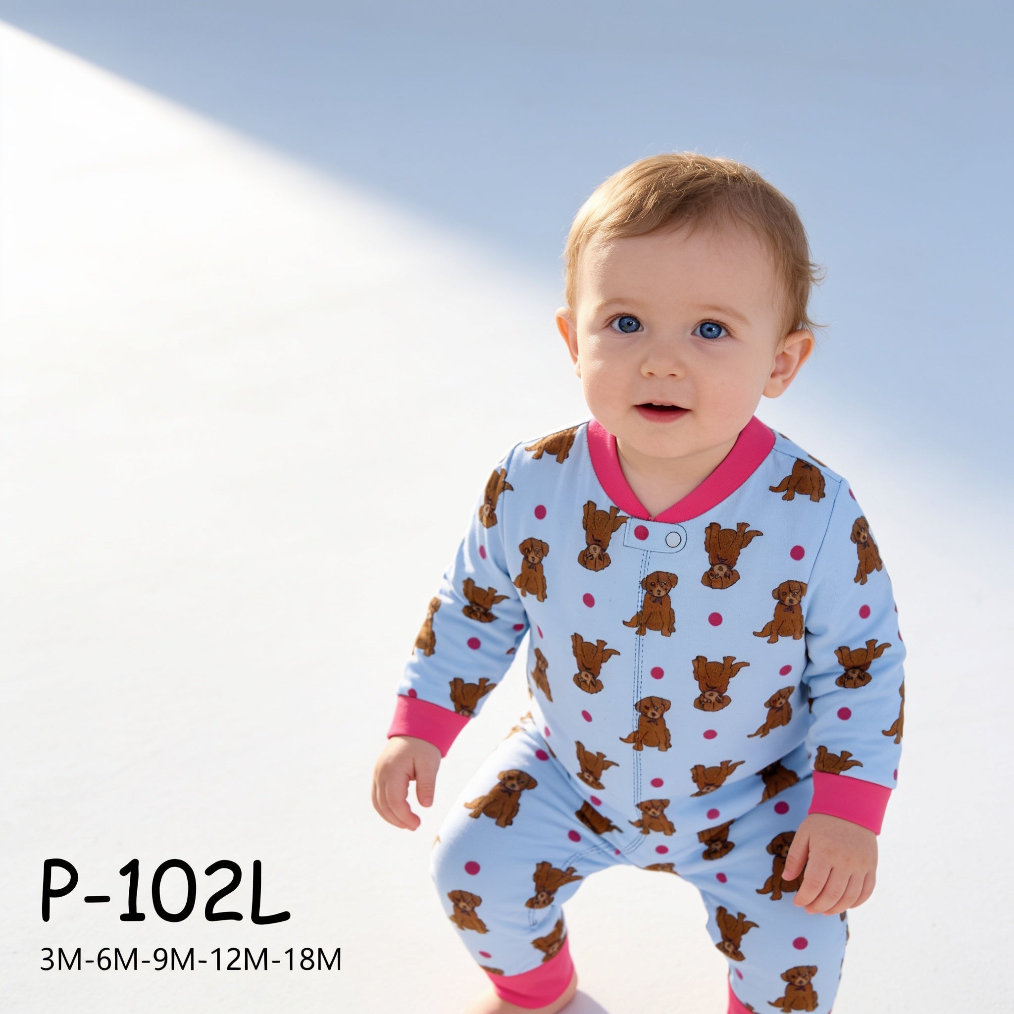 Pyjama combinaison bebe - chiots bleu - porte par un enfant - Candy Bebe