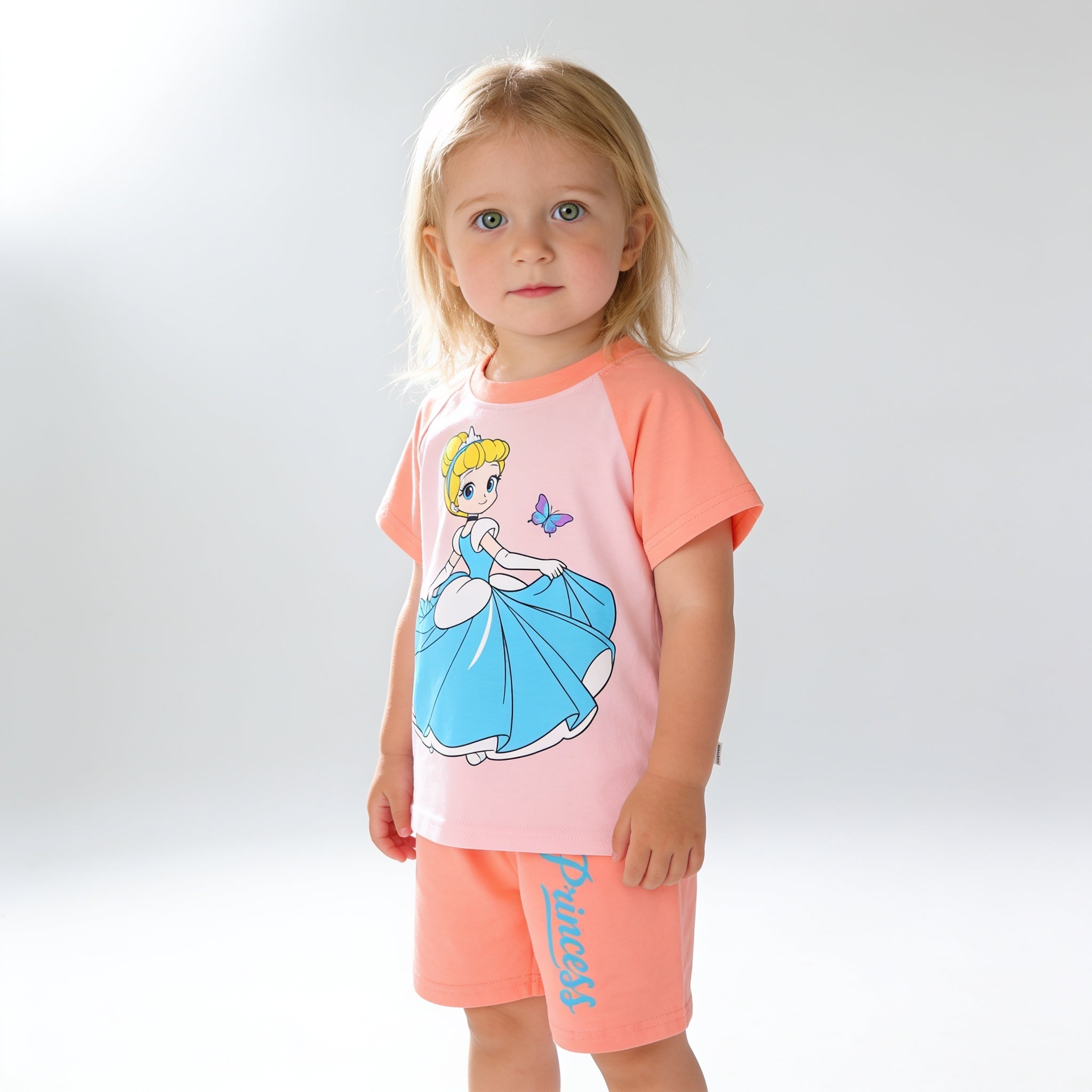 Ensemble pyjama court - corail - porte par un enfant - Candy Bebe